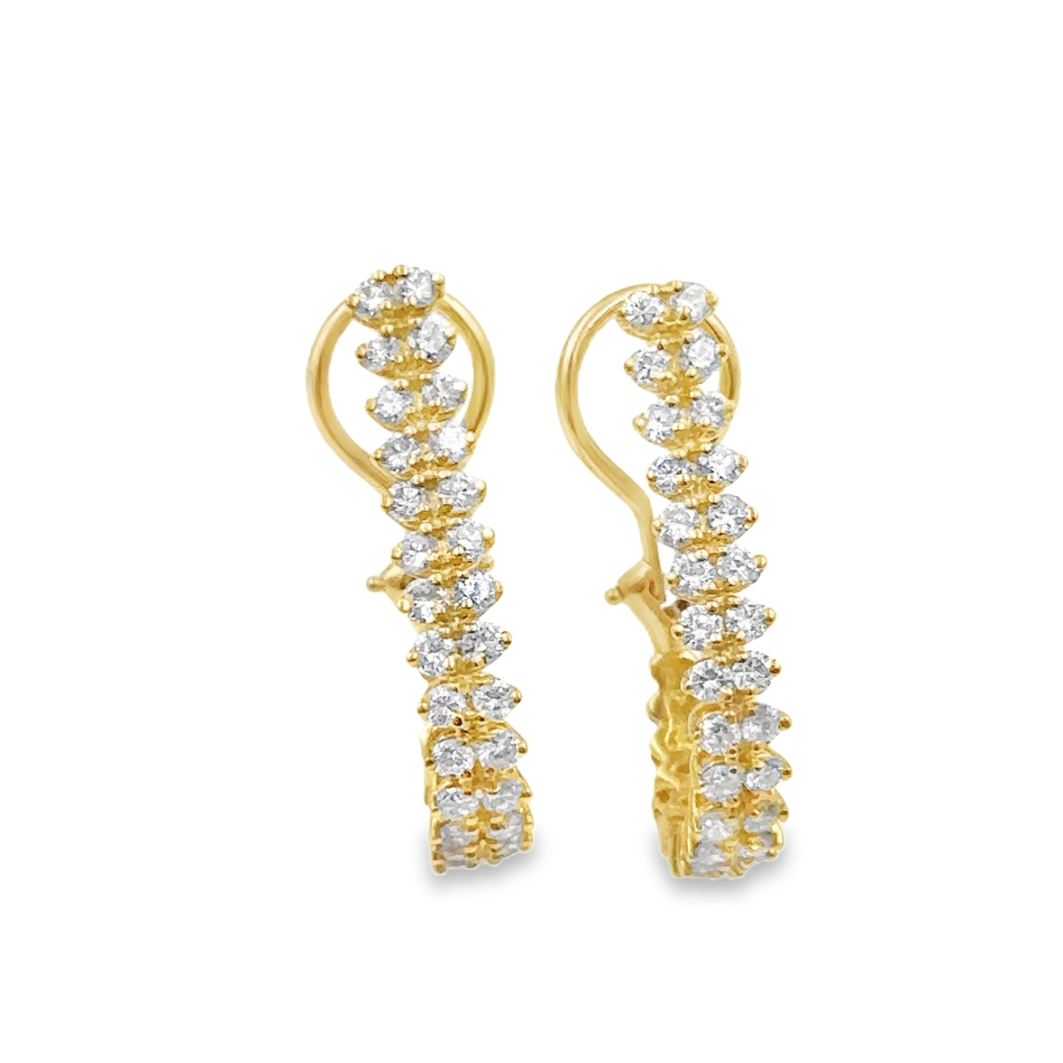 18K gold diamond hoop earrings.