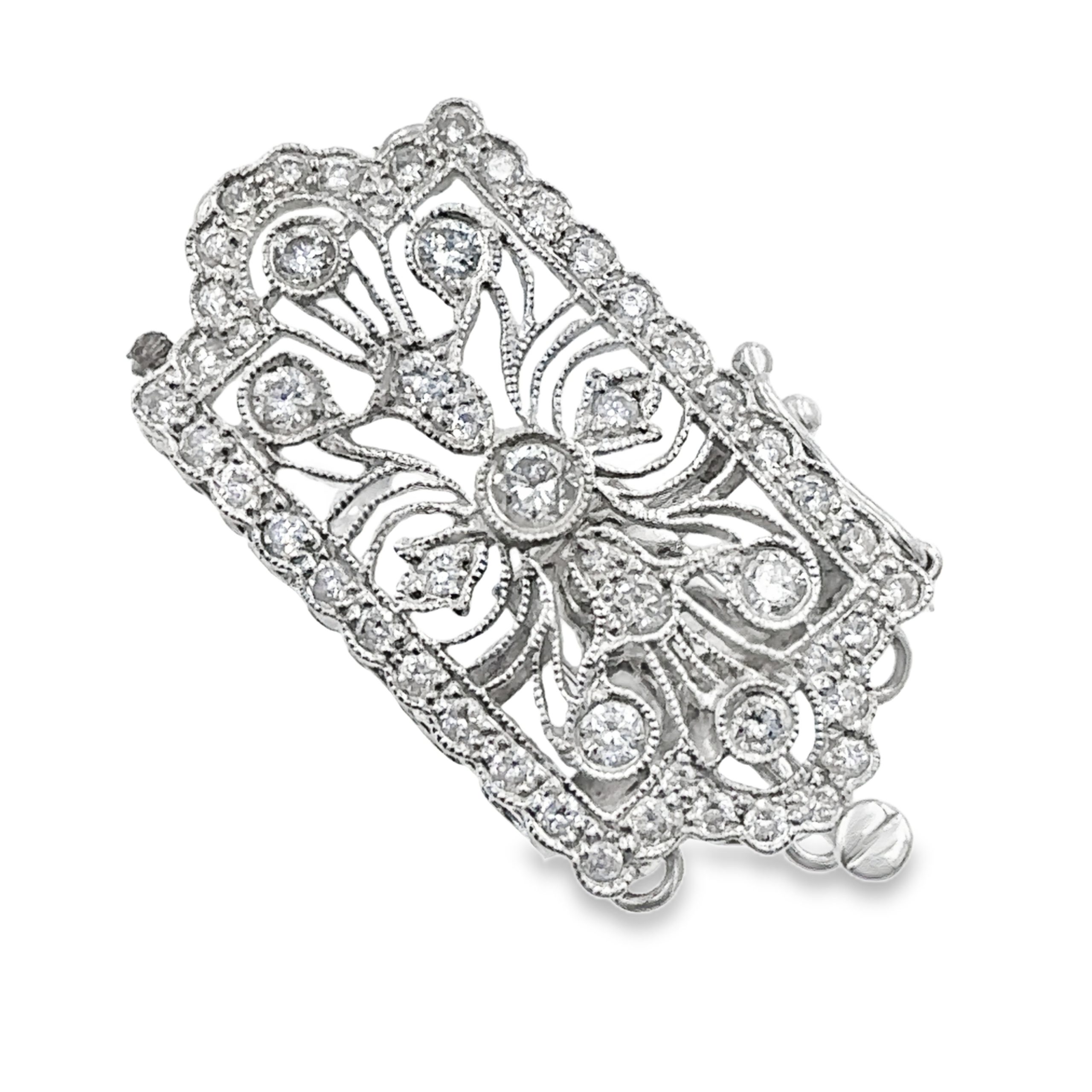 An 18K white gold diamond Art Deco style clasp.